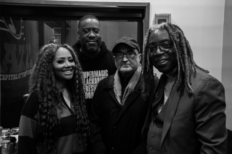 SRG/ILS CEO Claude Villani and SVP Craig Davis with Lalah Hathaway and Robert Glasper
